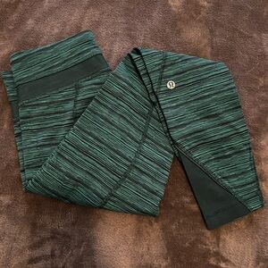 Lululemon Inspire tight with mesh, run leggings with pockets, size 4